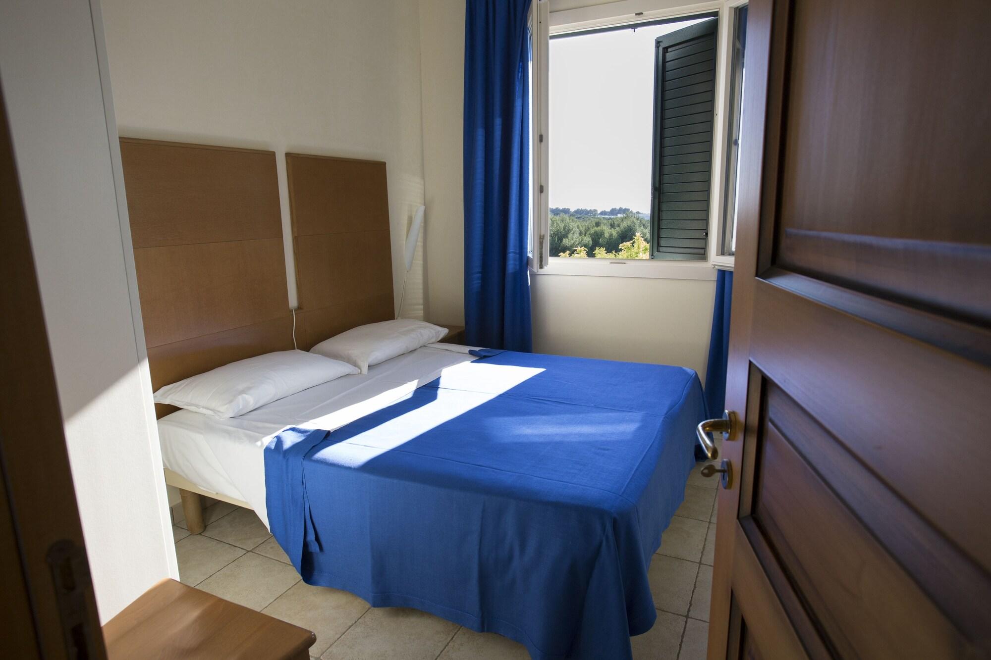 Hotel Resort Portoselvaggio Sant Isidoro  Exterior photo